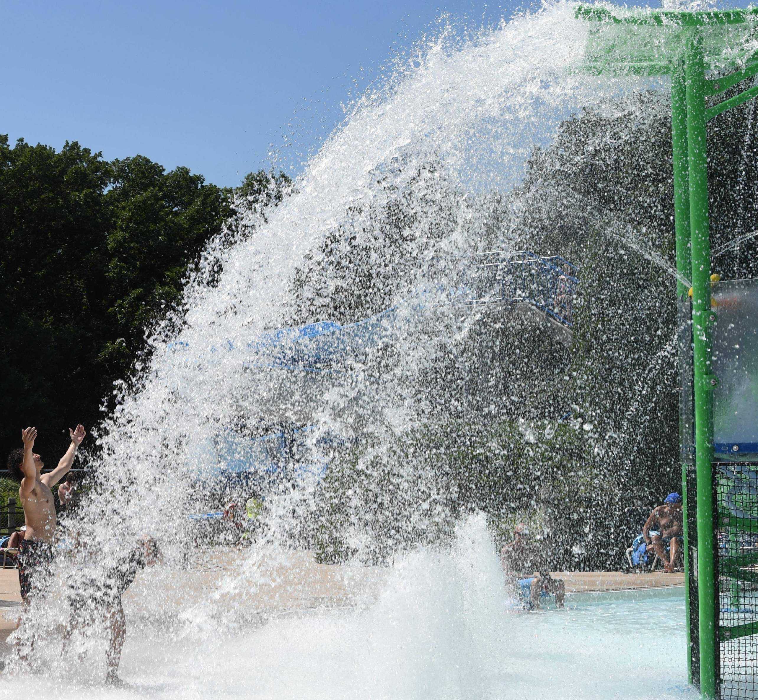 boy with arms reached out for water